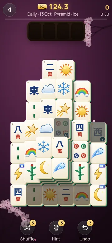The Daily board: a pyramid of picture and traditional tiles, some frozen in ice and some marked IQ+.